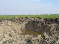 626131-DirtWorkDay1_SurroundingWaterDrainedToFirstHoleSmall.jpg