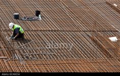 reinforced-concrete-construction-worker-on-a-construction-site-EC40CW.jpg