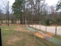 1-31-15 Driveway Fence Going Up.jpg