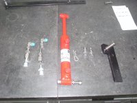 Snowblower hydraulic chute deflector cylinder, custom made bracket, hose adaptors and connectors.JPG