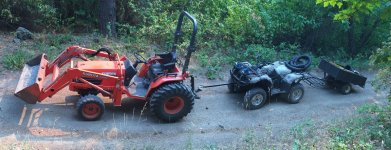 Kubota_towing_ATV_cargobench_trailer.jpg