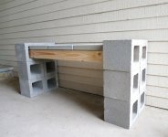 Wood-cinder-blocks-and-pavers-form-a-sturdy-bench.jpg