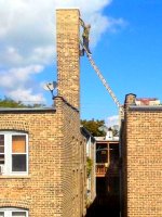man-roof-ladder-chimney.jpg