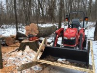 tractor and log dolmar.JPG