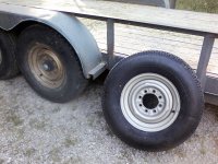 old spare and new trailer tire.jpg