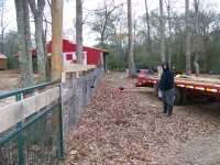 12-30-15 Luke & Tucker Helping with Fence Boards.jpg