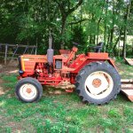 Belarus 250AS with bushhog 2x4.jpg