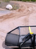 UTV blade pushes rock (DL).jpg