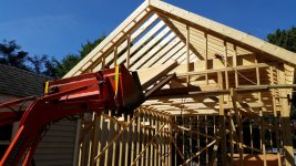 Lifting Plywood Into Building.jpg