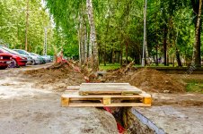 32099895-Wooden-pallet-is-used-as-a-temporary-improvised-crossing-over-a-narrow-trench-Stock-Pho.jpg