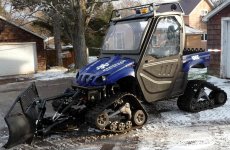 Rhino with cab, blade driveway.(DL).jpg