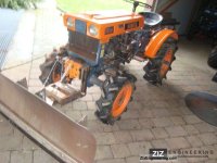 kubota__b6000_wheel_drive_with_snow_plow_2011_1_lgw.jpg