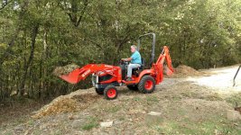 Pappy moving mulch.jpg