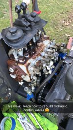 backhoe33 disconnecting lines.JPG backhoe33 disconnecting lines.JPG
