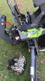 backhoe34 valve assembly removed.jpg backhoe34 valve assembly removed.jpg