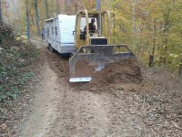 Trailer to build site - makin the road wider.jpg