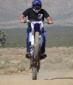 770815-harv jumping motorcycle.JPG