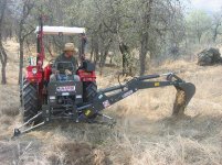 836499-TBN Backhoe Dumping Load.JPG
