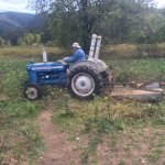 Me on tractor killing blackberries 8-18-2016 IMG_1517 (2).jpg