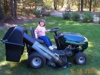 319626-Daughter_On_Mower.jpg