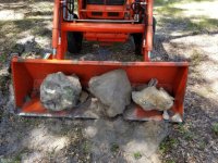 08 25 18 several rocks in compound yard removed w subsoiler small.jpg