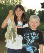 Both of them caught their first fish ever!!  April 2011.JPG