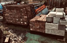 Bricks piled on two plastic pallets in my backyard now Nov. 2019.jpg