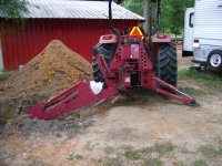 5-12-20 Backhoe In Repair Hole.jpg