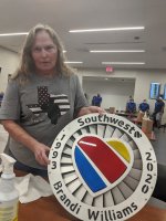 8-31-20 Brandi With Retirement Plaque.jpg