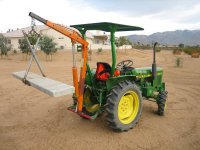 crane lifting bench before being painted.jpg