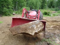 7-6-06 Moving rocks.JPG