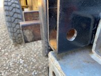 Retaining pin hole already wallowing out with just less than 20 hours use.jpg Retaining pin hole already wallowing out with just less than 20 hours use.jpg