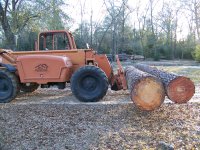 1-15-21 Lull Hauling TWO 21 Foot Logs.jpg