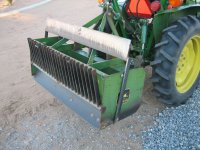 sand float and brush rake in storage position.jpg