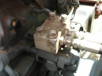 L345 L355 modify hyd block to reconnect internal hydraulics.JPG