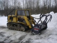 ASV 4810 with Loftness Carbide Cutter.JPG