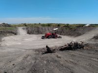 Tractor in pond getting close to done.jpg