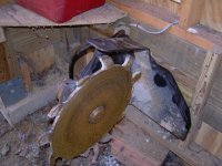 stump ginder on hanger in shed.JPG
