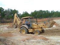 Digging out the small pond with the backhoe..jpg