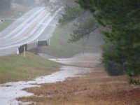 Highway and creek flooding, 14 Jan 2007.jpg