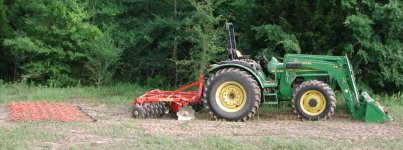 9-178772-Tractor_with_disc_and_chain_harrow.jpg