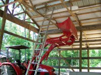 4-21-07 storing insulation in the barn rafters.jpg