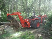 Kioti_StumpHaulIntoWoods_Closeview_31MAY07_1200x.jpg