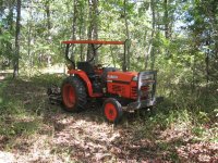 tractorinwoods.JPG