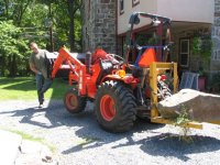 rock on tractor.JPG