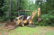 Backhoe taking out trees and saplings..jpg