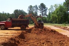 backhoe loading dump truck.jpg