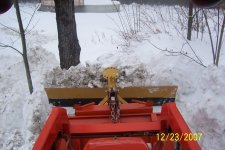 PUSHING SCRAPINGS OFF DRIVEWAY (1524 x 1016).jpg